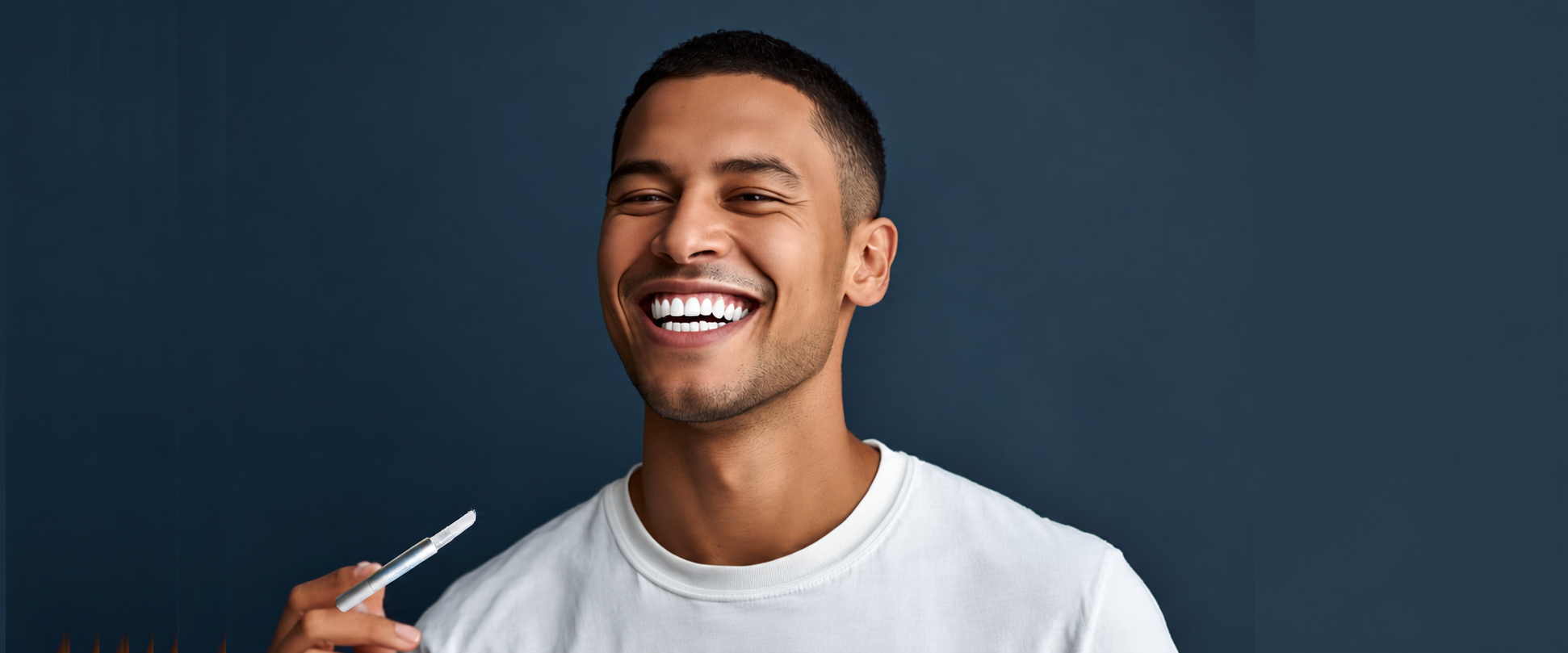 Man using Smile Science Harley Street teeth whitening pen as part of daily whitening maintenance routine